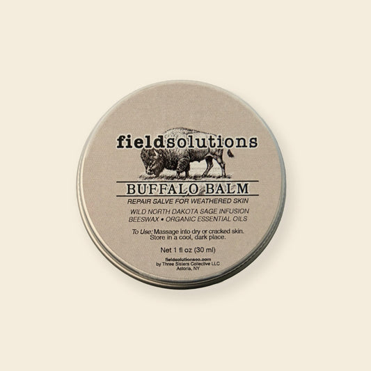 Buffalo Balm wild prairie sage salve in a round tin on a cream background